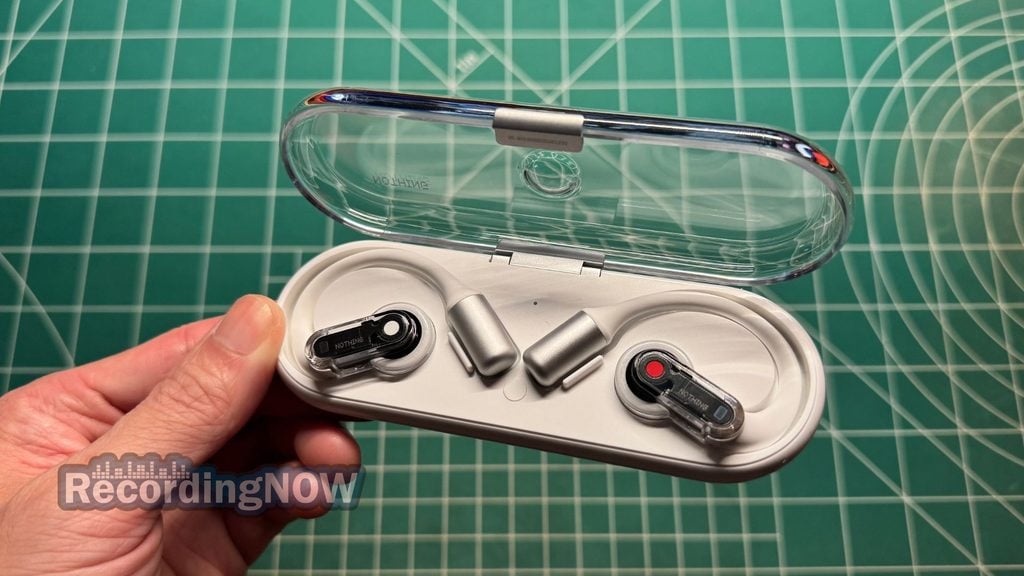Holding Nothing Ear (Open) charging case in hand