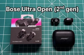 Bose Ultra Open Earbuds 2nd Gen in black next to charging case and box