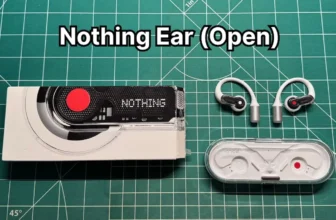 Nothing Ear (Open) open ear earbuds next to charging case and box