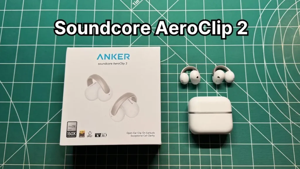 Anker Soundcore AeroClip 2 open ear clip on earbuds next to charging case and box