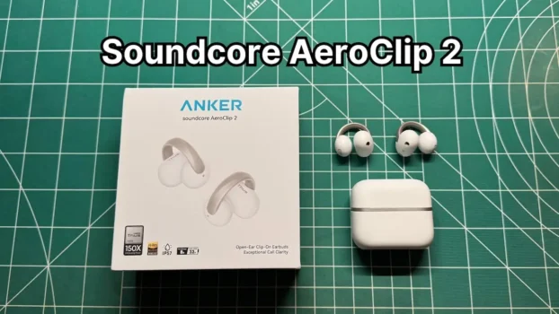Anker Soundcore AeroClip 2 open ear clip on earbuds next to charging case and box