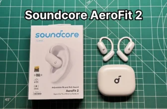 Anker Soundcore AeroFit 2 open ear earbuds next to charging case and box