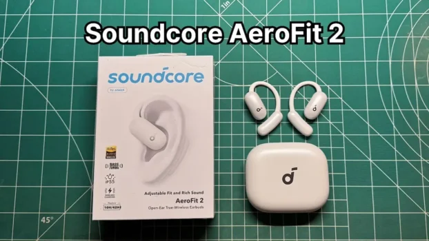 Anker Soundcore AeroFit 2 open ear earbuds next to charging case and box