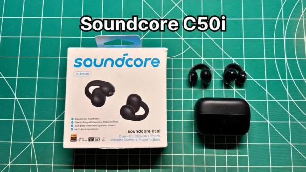 Anker Soundcore C50i wireless clip on earbuds next to charging case and box packaging